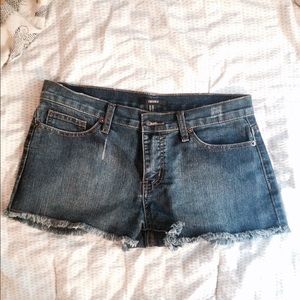 Mid rise denim distressed shorts