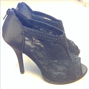 Black lace zip heels. 3.5 inch tall