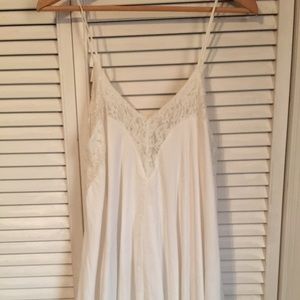 White camisole dress with lace.