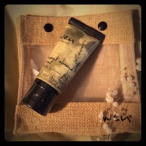 Cleansing conditioner and small bag.