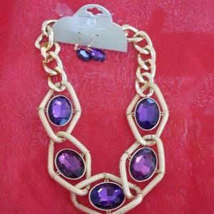 Gold necklace with purple diamonds