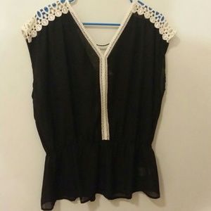 Sheer top with detailing