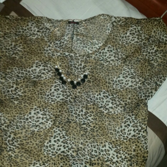 MAKE AN OFFER. LEAPORD PRINT BLOUSE.