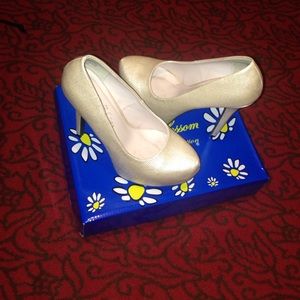 Champagne sparkly heels.