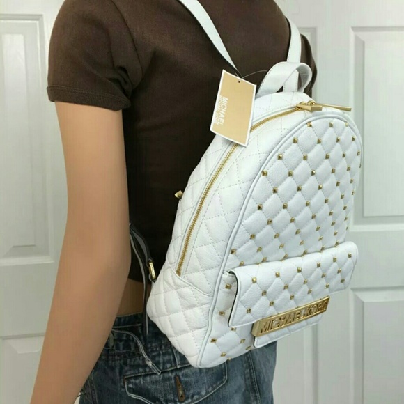 Michael Kors White Gold Leather Backpack.