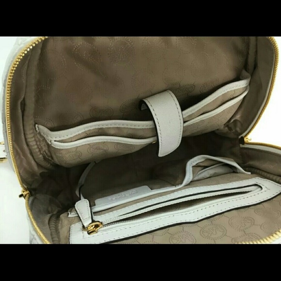 Michael Kors White Gold Leather Backpack.