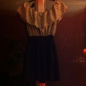 Black and white polka-dot top dress.