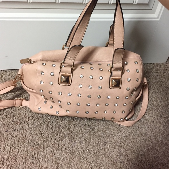 Charming Charlie's. Light pink purse
