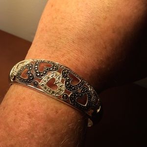 Bracelet has marcasite and 6 tiny diamonds.