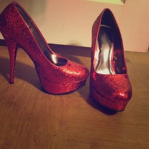 Red shimmery high heels