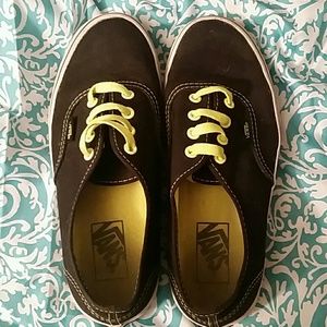 Black and neon yellow Vans