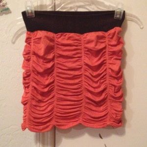 Pink/Salmon colored mini skirt