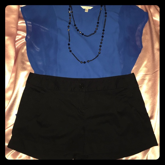 Black shorts with cuffed legs