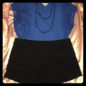 Black shorts with cuffed legs