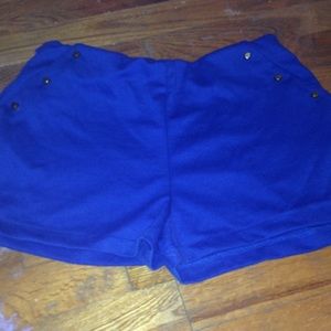 Blue shorts with gold studs