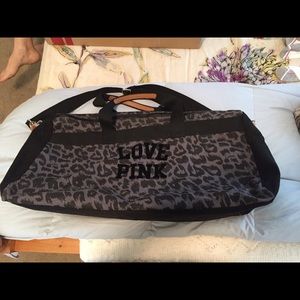 Grey VS cheetah print duffle bag
