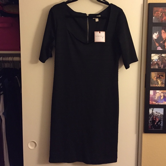 Black figure hugging cocktail dress