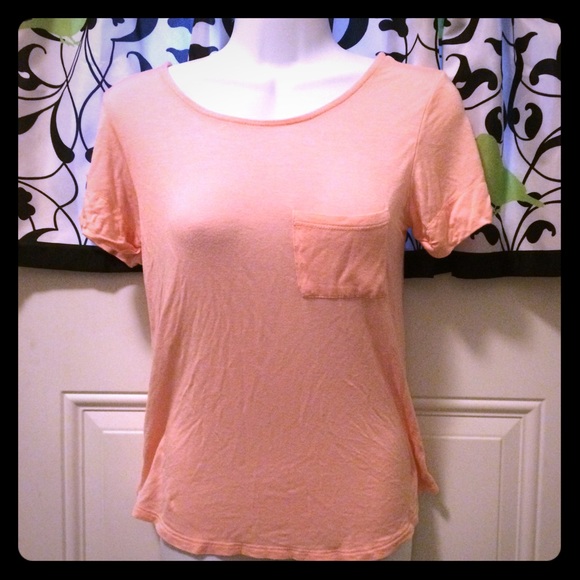 Cute peach shirt with back cut out