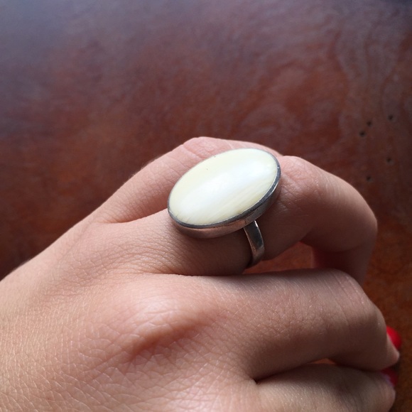 Handmade sterling silver ring with cream stone