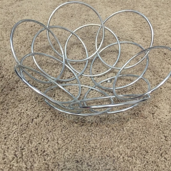 Two metal fruit baskets