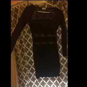 Black bodycon dress with mesh cutouts