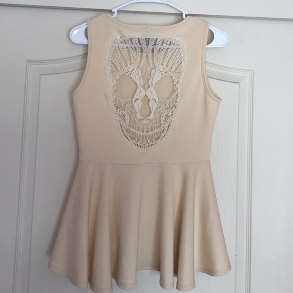 Romeo & Juliet Couture lace skull peplum top