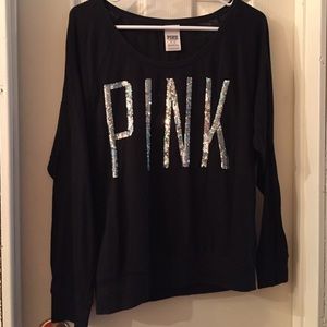 Thin black long sleeve shirt.