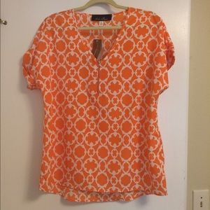 Orange and White Lattice Print top by Francesca's