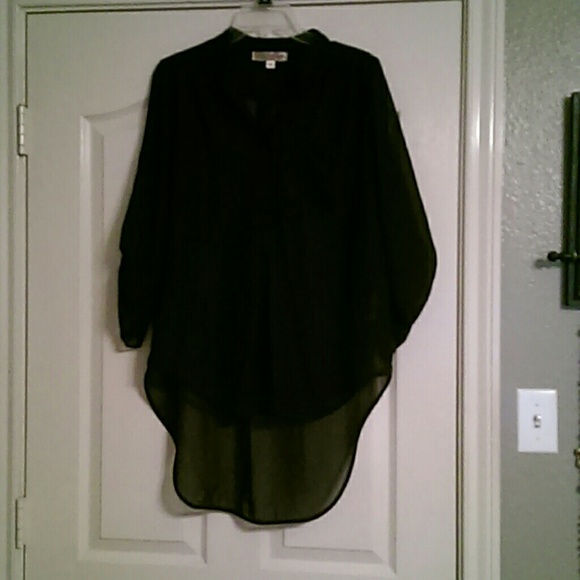 A see through black blouse!