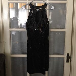 Black sequined dress.