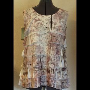 Multicolored top that hides the extra pounds!