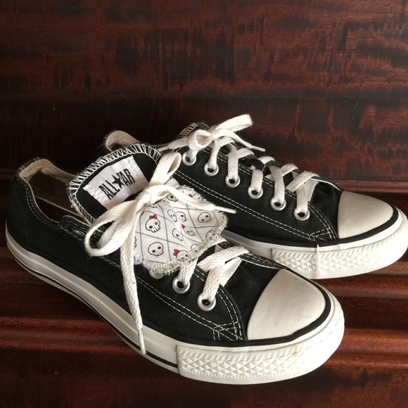 Converse all*stars black with skull tongue.
