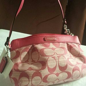A beautiful wristlet pink still with tag