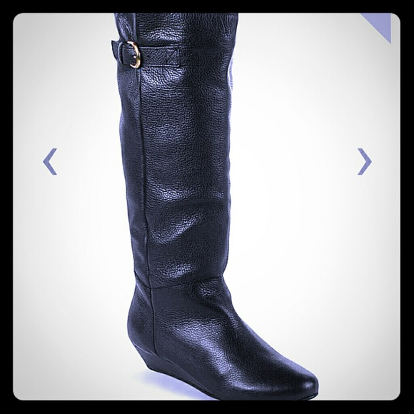 Black Steve Madden iden boot