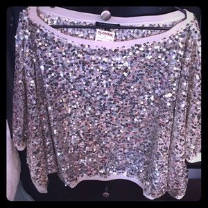An oversized, large, sheer and sequin top!