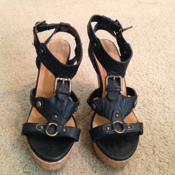 Black strappy wedges with gold buckle detailing