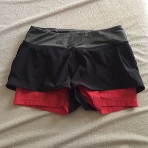 Orange and grey spandex running shorts