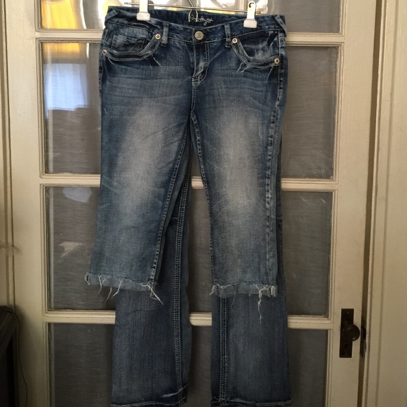 1 pair of jeans and 1 Capri