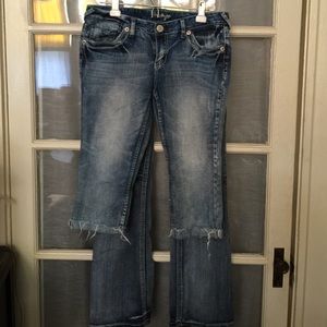 1 pair of jeans and 1 Capri