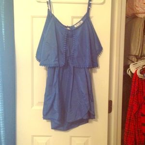 Royal blue pedal dress with open back.