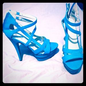 Blue open toe pumps