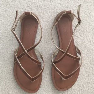 Tan sandles with gold detailing