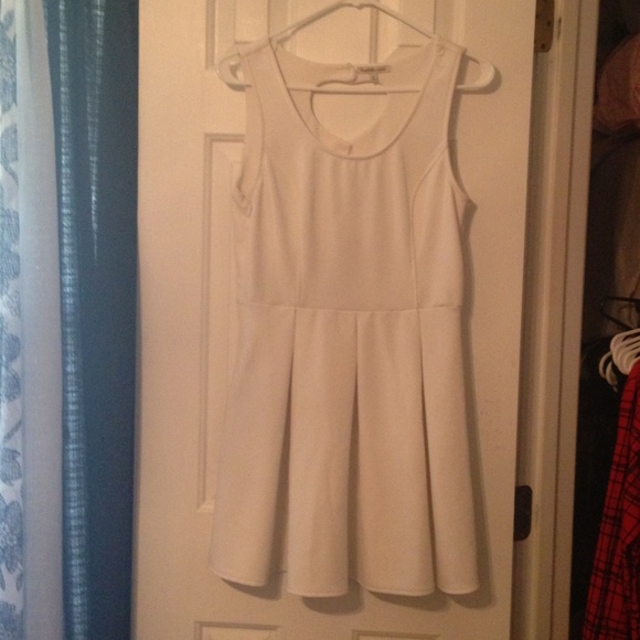 White skater dress with heart back cuts