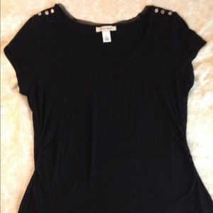 black shirt/silver stud detailing on shoulders