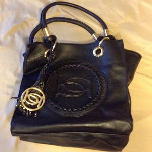 A beautiful BeBe purse.