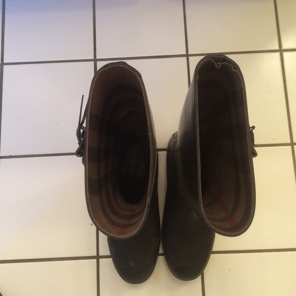 Men\'s Burberry rain boots.