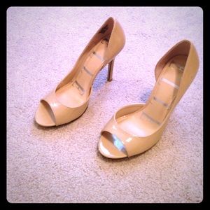 Nude peep toe pumps