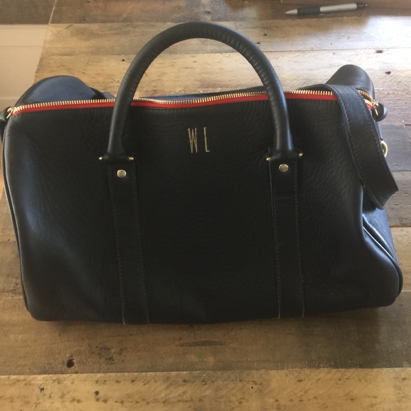 Clare Vivier monogrammed navy leather handbag