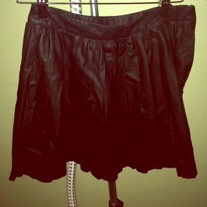 Black size 4 faux leather mini skirt