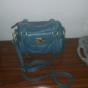 Blue-green cross body bag midi.